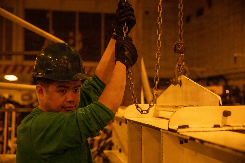 USS Gerald R. Ford (CVN 78) Sailor Operates Equipment USS Gerald R. Ford (CVN 78) Sailor Operates Equipment