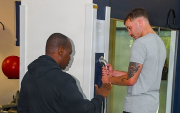 Physical therapy clinic staff provides patient care