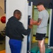 Physical therapy clinic staff provides patient care