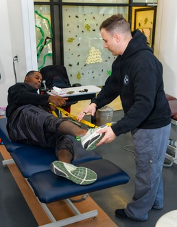 Physical therapy clinic staff provide patient care