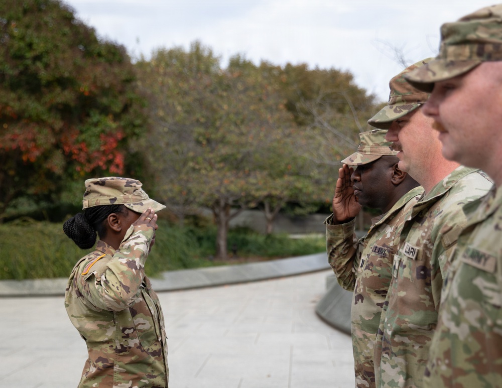 A Mississippi National Guard Soldier gets promoted in front of the Martin Luther King, Jr. Memorial