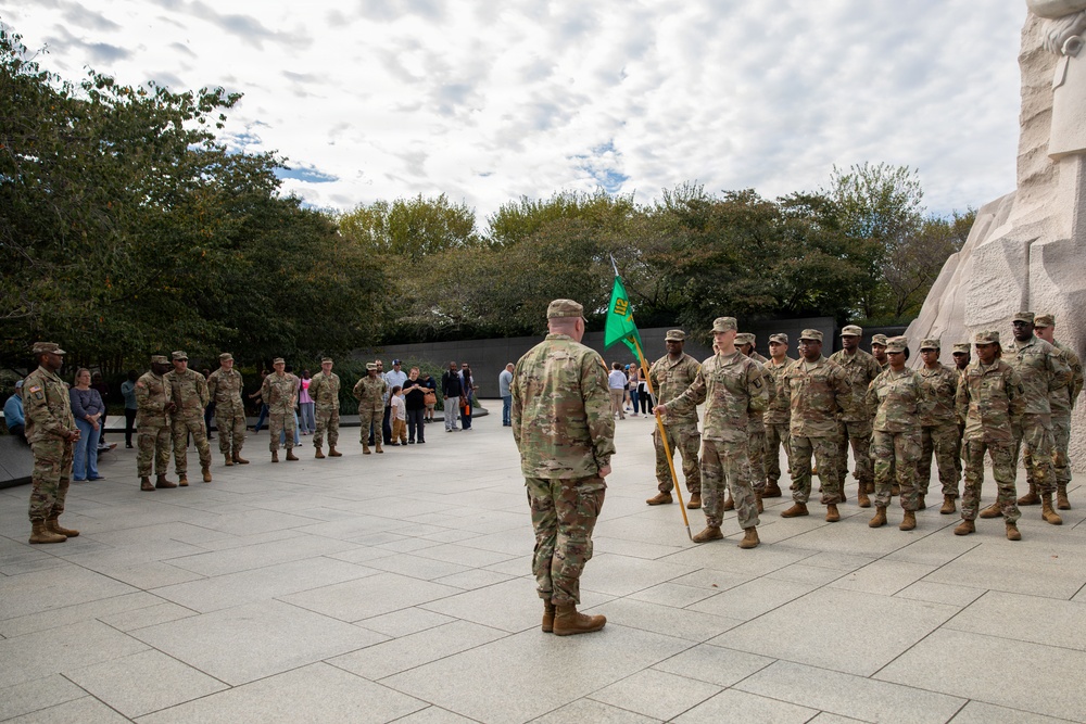 A Mississippi National Guard Soldier gets promoted in front of the Martin Luther King, Jr. Memorial