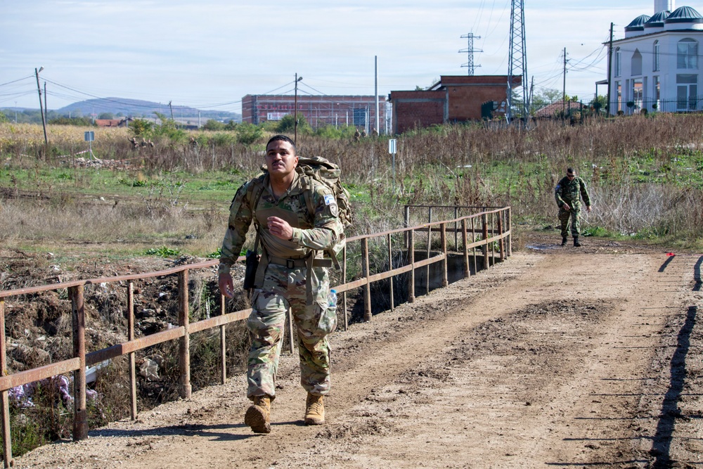KFOR Multinational Soldiers Test Endurance During Danish Contingent March