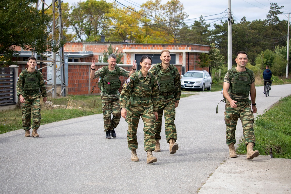 KFOR Multinational Soldiers Test Endurance During Danish Contingent March