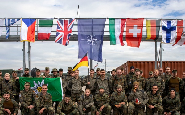 KFOR Multinational Soldiers Test Endurance During Danish Contingent March