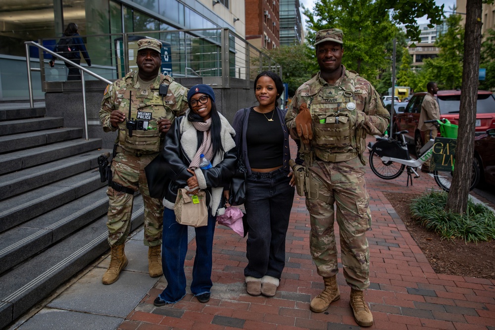 Mississippi National Guard Soldiers take photos with members of the public in Washington, D.C.