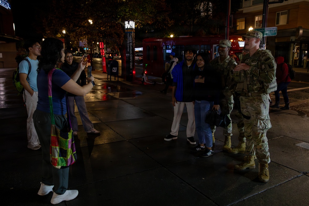 Mississippi National Guard Soldiers take photos with members of the public in Washington, D.C.