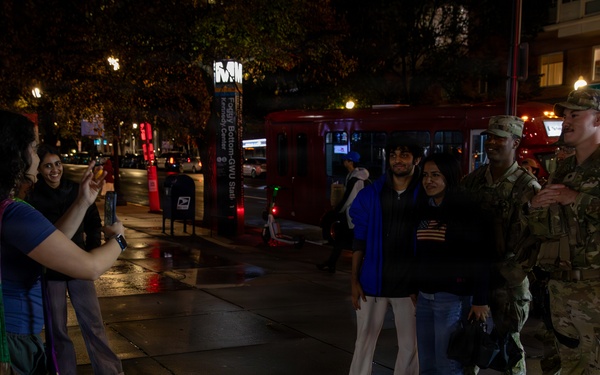 Mississippi National Guard Soldiers take photos with members of the public in Washington, D.C.
