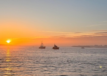 A U.S. Coast Guard 47-foot Motor Lifeboat crew from Coast Guard Station Coos Bay tows a 55 foot fishing vessel near Coos Bay