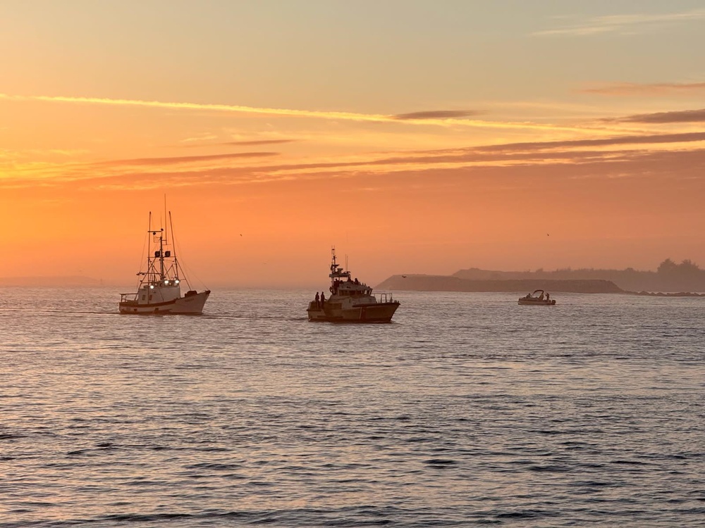 A U.S. Coast Guard 47-foot Motor Lifeboat crew from Coast Guard Station Coos Bay tows a 55 foot fishing vessel near Coos Bay