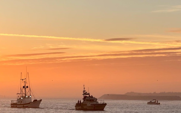 A U.S. Coast Guard 47-foot Motor Lifeboat crew from Coast Guard Station Coos Bay tows a 55 foot fishing vessel near Coos Bay
