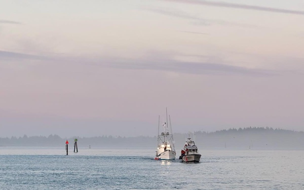 A U.S. Coast Guard 47-foot Motor Lifeboat crew from Coast Guard Station Coos Bay tows a 55 foot fishing vessel near Coos Bay