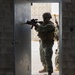 U.S. Navy Sailors and Marines perform Close Quarters Battle drills