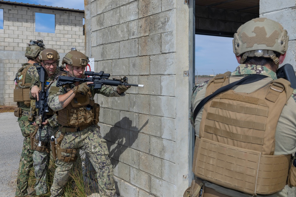U.S. Navy Sailors and Marines perform Close Quarters Battle Drills