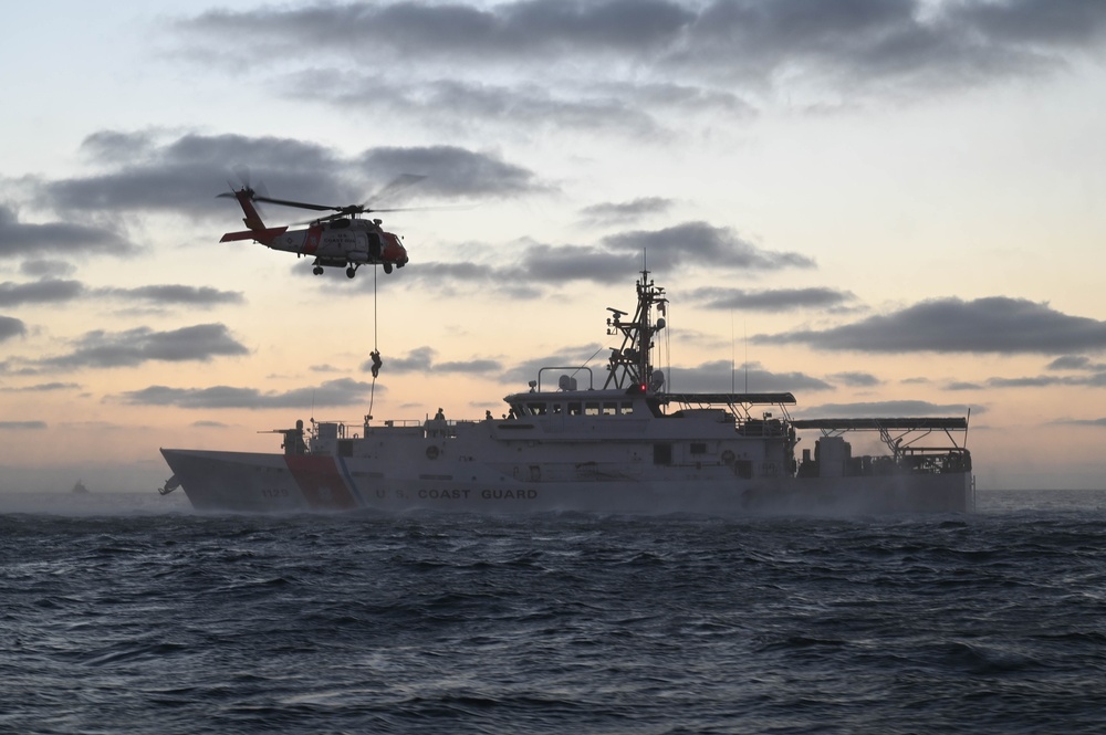 Coast Guard Cutter Forrest Rednour crew members conducts fast-rope training off the Southern California coast