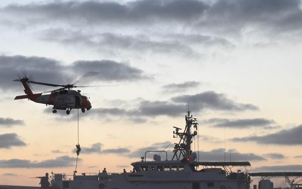 Coast Guard Cutter Forrest Rednour crew members conducts fast-rope training off the Southern California coast