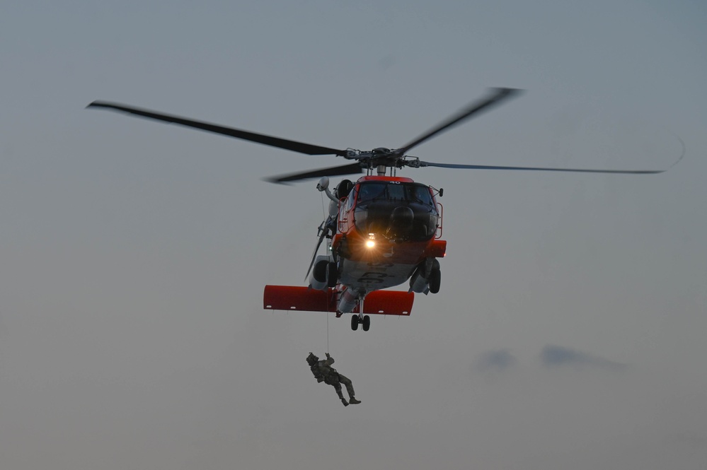 Coast Guard Cutter Forrest Rednour crew members conducts fast-rope training off the Southern California coast