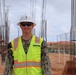 A Civil Engineering Corps Office Tours a Project Site