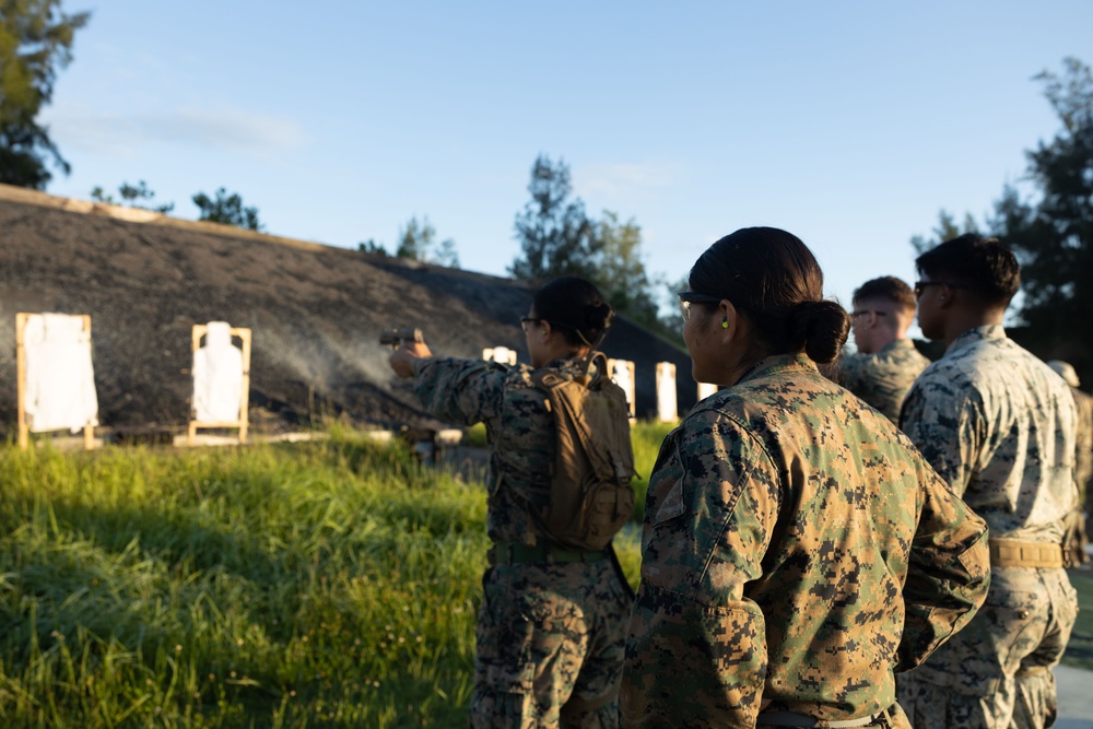 Okinawa Marines Participate in a Combat Marksmanship Coach Course Pistol Range