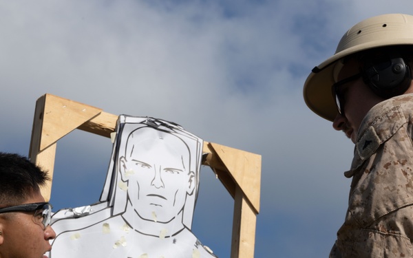 Okinawa Marines Participate in a Combat Marksmanship Coach Course Pistol Range