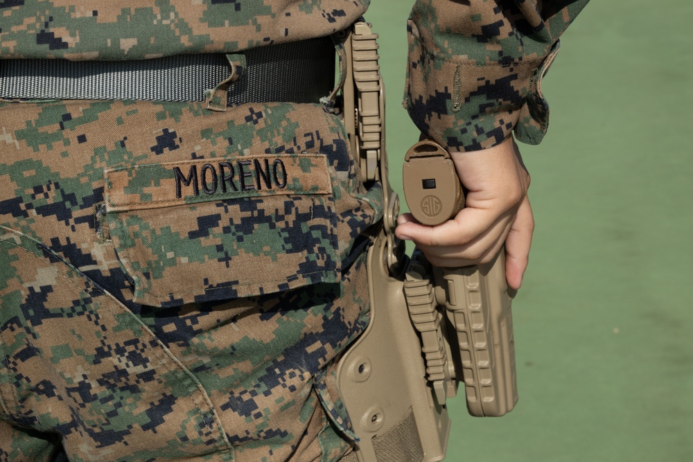 Okinawa Marines Participate in a Combat Marksmanship Coach Course Pistol Range