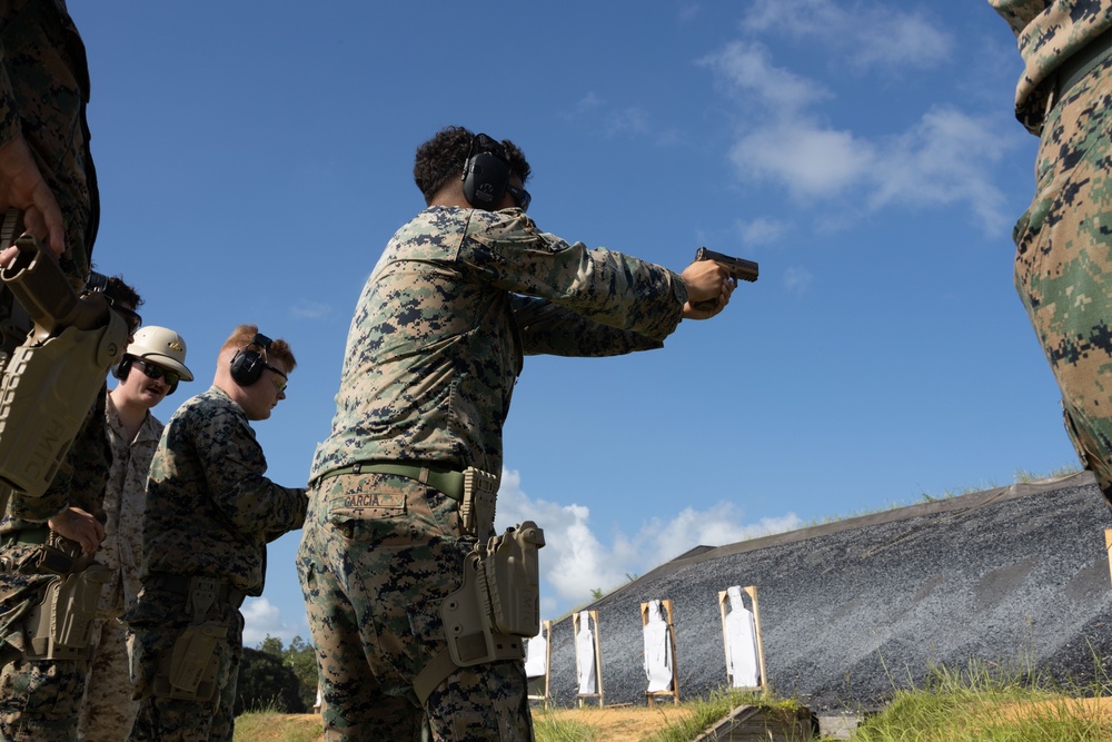 Okinawa Marines Participate in a Combat Marksmanship Coach Course Pistol Range