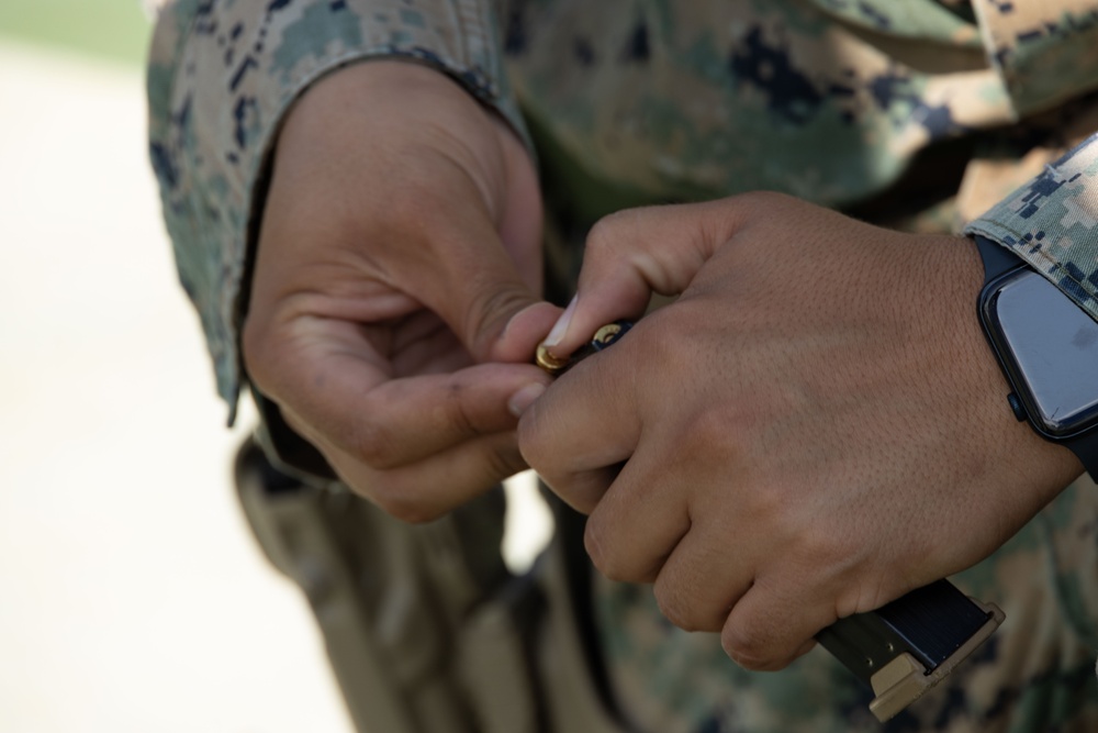 Okinawa Marines Participate in a Combat Marksmanship Coach Course Pistol Range