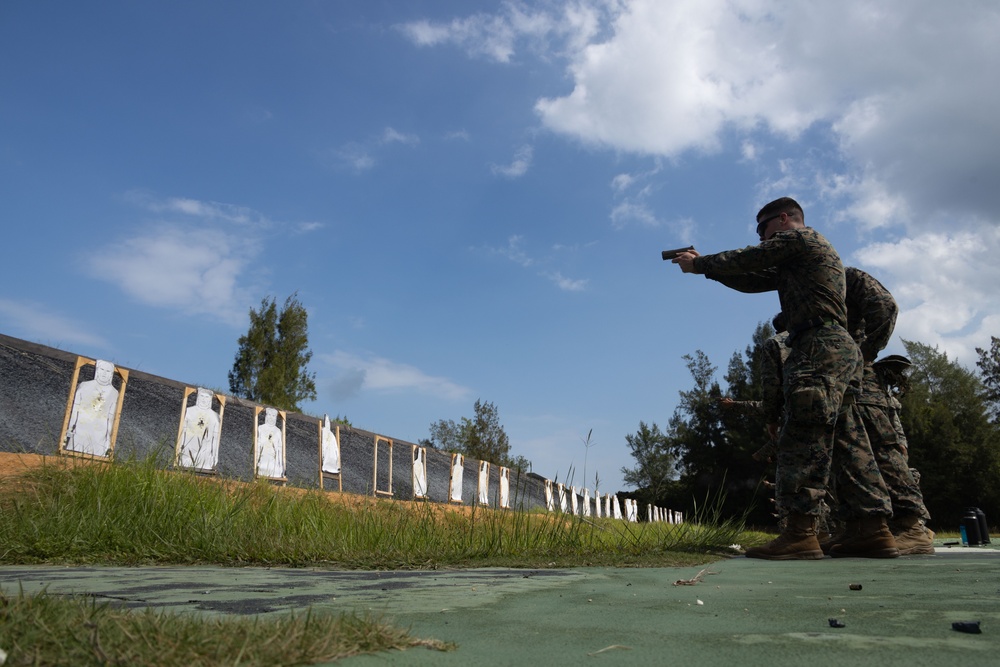 Okinawa Marines Participate in a Combat Marksmanship Coach Course Pistol Range