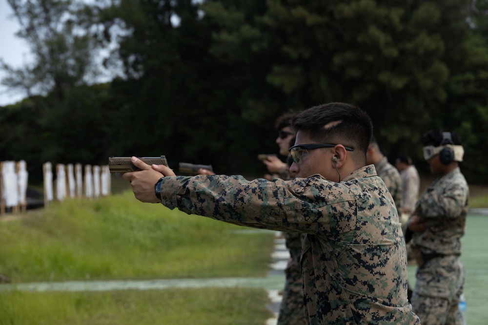 Okinawa Marines Participate in a Combat Marksmanship Coach Course Pistol Range