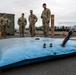 921st CRS teams up with 60th CES for hygiene pallet training