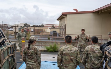 921st CRS teams up with 60th CES for hygiene pallet training