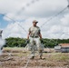 346th AEW lay concertina wire