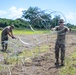 346th AEW lay concertina wire