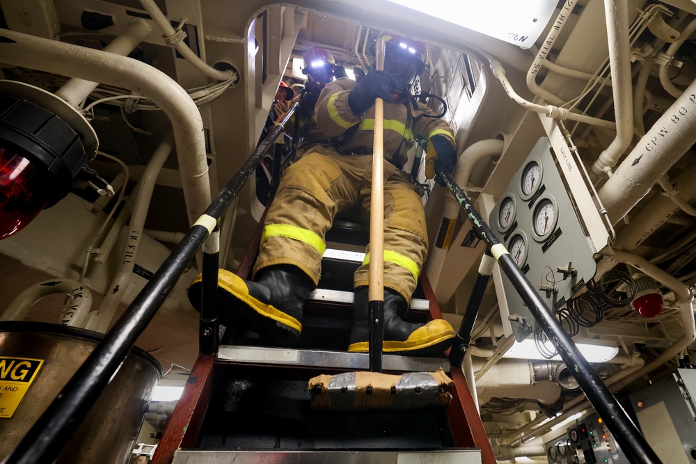 Initial attack team in a Damage Control Drill aboard the USS Paul Ignatius (DDG 117)