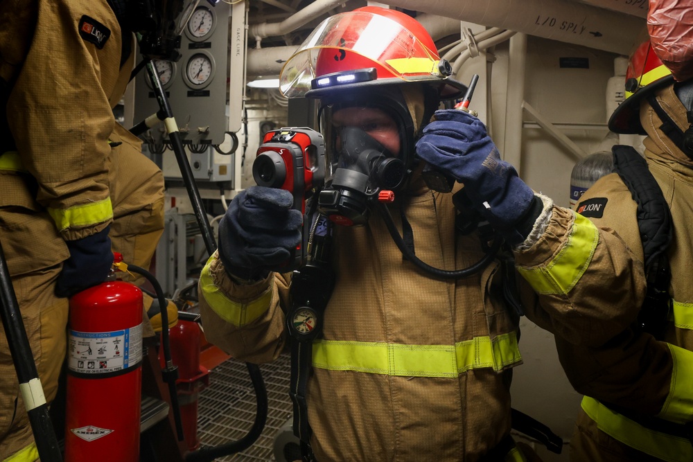 Initial attack team in a Damage Control Drill aboard the USS Paul Ignatius (DDG 117)