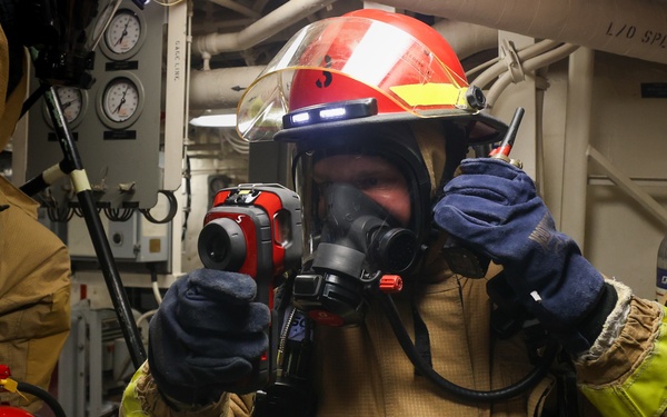 Initial attack team in a Damage Control Drill aboard the USS Paul Ignatius (DDG 117)