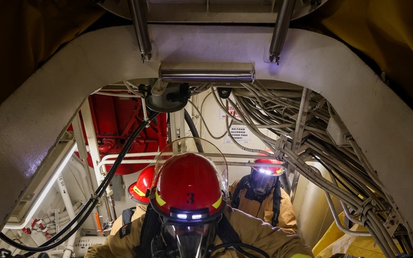 Initial attack team in a Damage Control Drill aboard the USS Paul Ignatius (DDG 117)