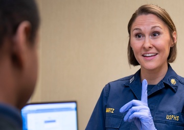 Lt. Amber Martz conducts a physical
