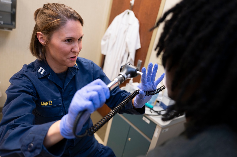 Lt. Amber Martz conducts a physical Lt. Amber Martz conducts a physical