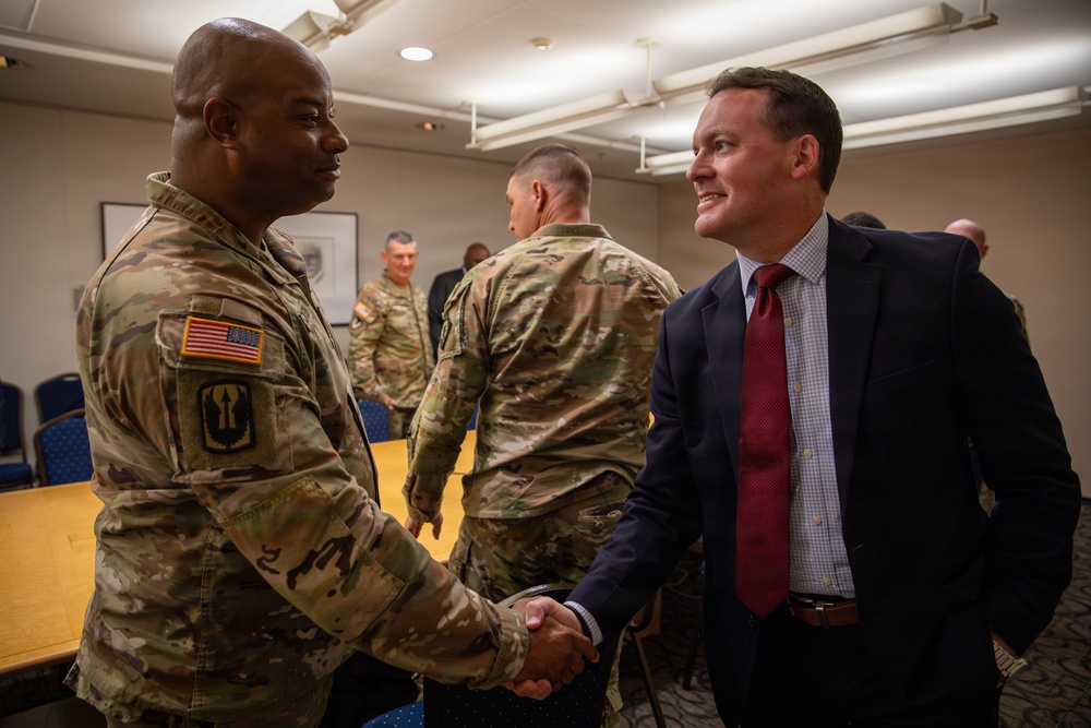 Lt. Col. Steven Jackson shakes hands with a Deputy Assistant Director of the U.S. Secret Service Lt. Col. Steven Jackson shakes hands with a Deputy Assistant Director of the U.S. Secret Service