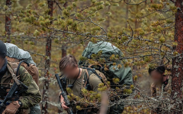 Swedish rangers and U.S. SOF conduct squad movements during ASP 26