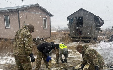 Snowfall tests AKOM crews, but mission to aid Alaskans presses on