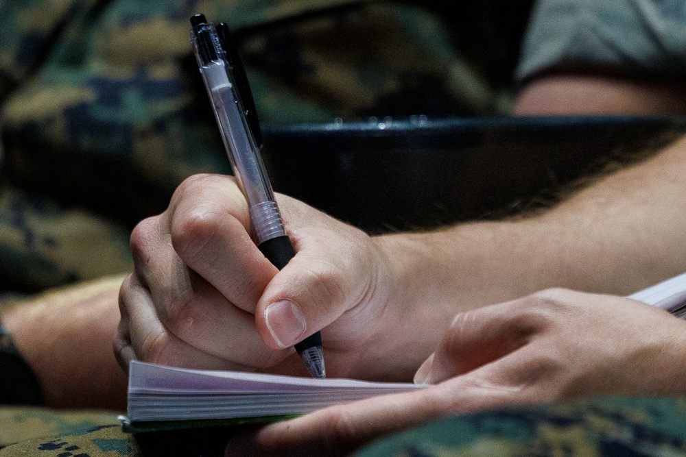 MCAS Iwakuni personnel attend the Road to War brief for exercise Active Shield 26 MCAS Iwakuni personnel attend the Road to War brief for exercise Active Shield 26