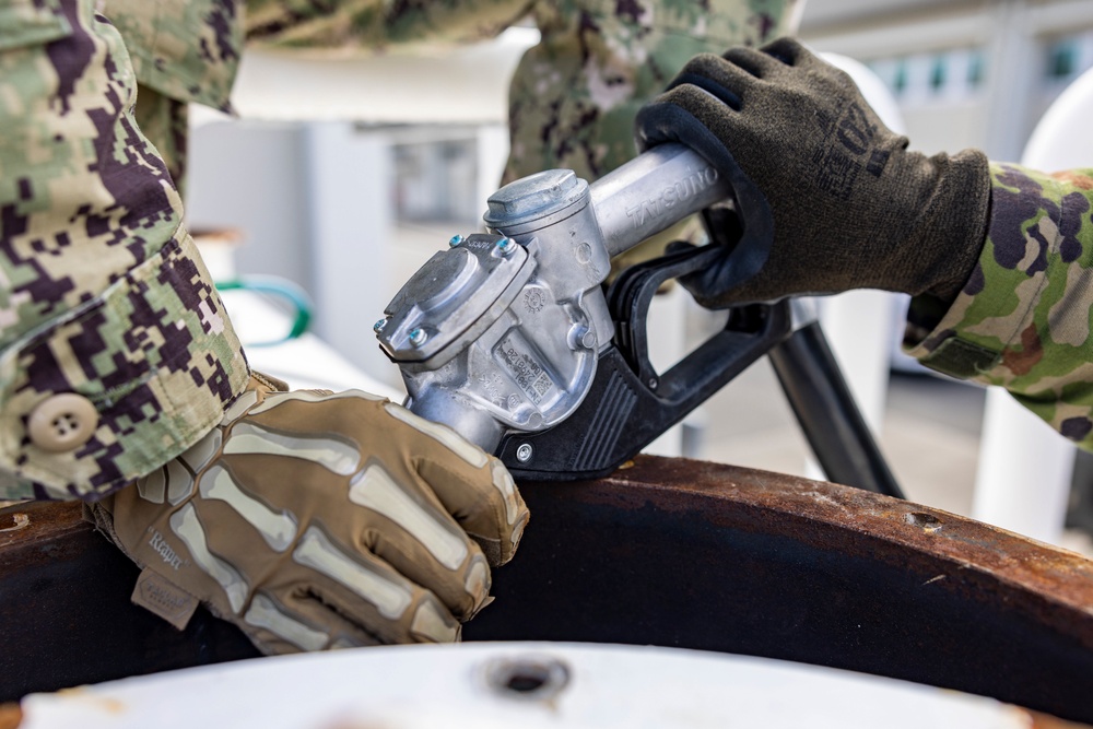 NMCB 4 and JGSDF refuel generators during Active Shield 26 NMCB 4 and JGSDF refuel generators during Active Shield 26