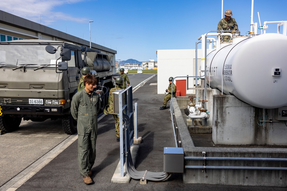 NMCB 4 and JGSDF refuel generators during Active Shield 26 NMCB 4 and JGSDF refuel generators during Active Shield 26