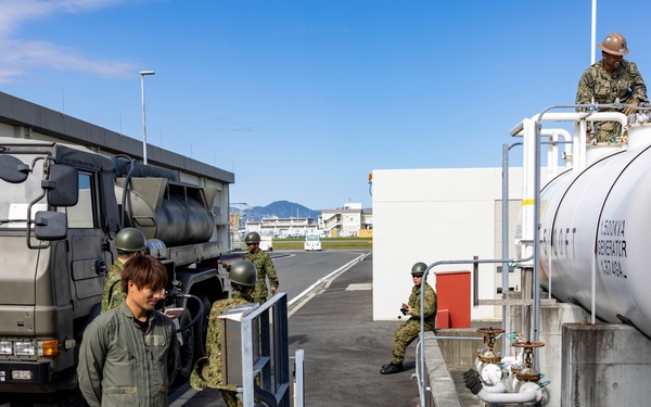 NMCB 4 and JGSDF refuel generators during Active Shield 26
