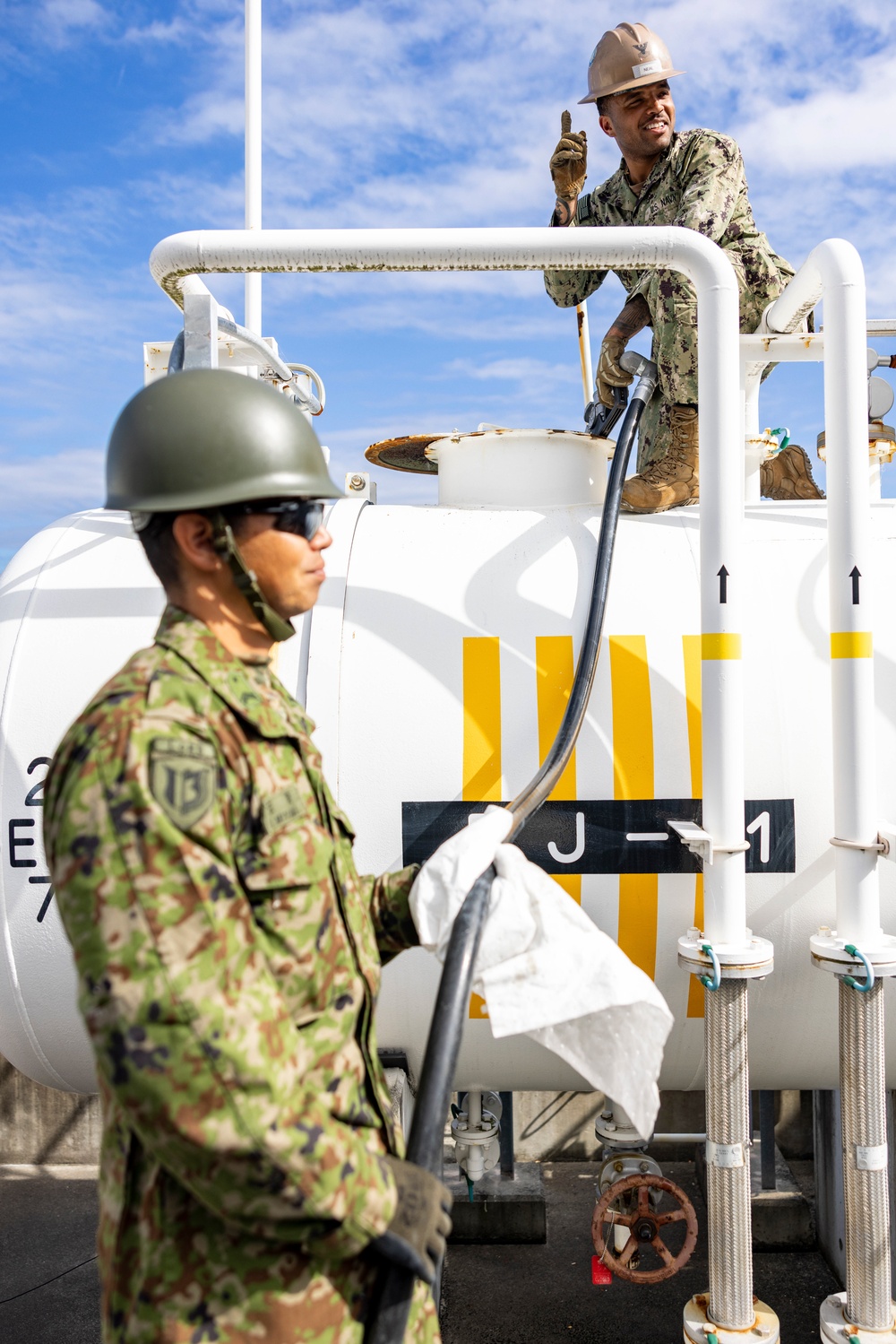NMCB 4 and JGSDF refuel generators during Active Shield 26 NMCB 4 and JGSDF refuel generators during Active Shield 26