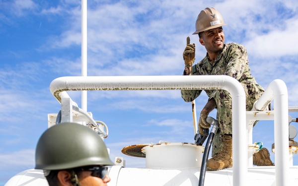 NMCB 4 and JGSDF refuel generators during Active Shield 26