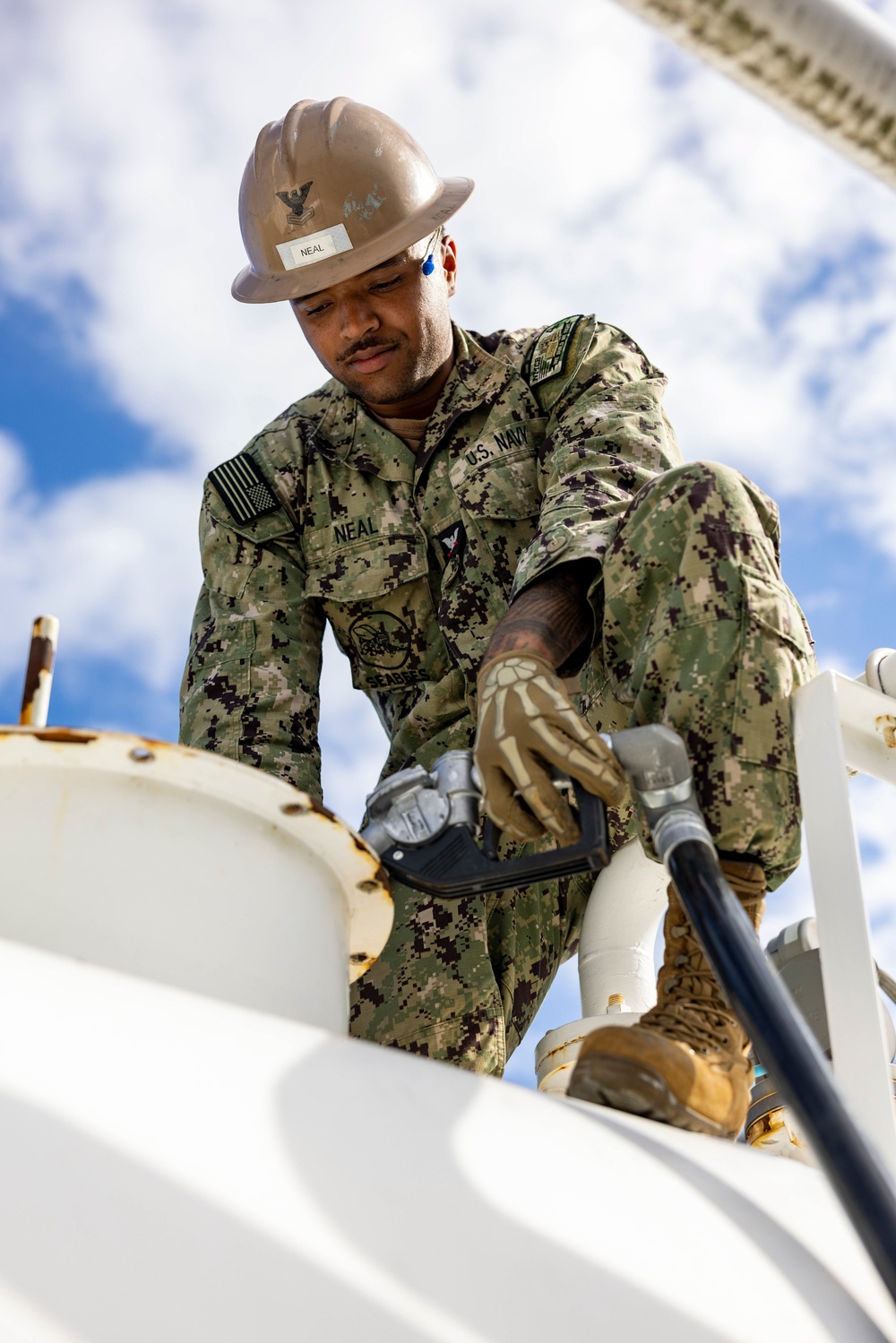 NMCB 4 and JGSDF refuel generators during Active Shield 26 NMCB 4 and JGSDF refuel generators during Active Shield 26