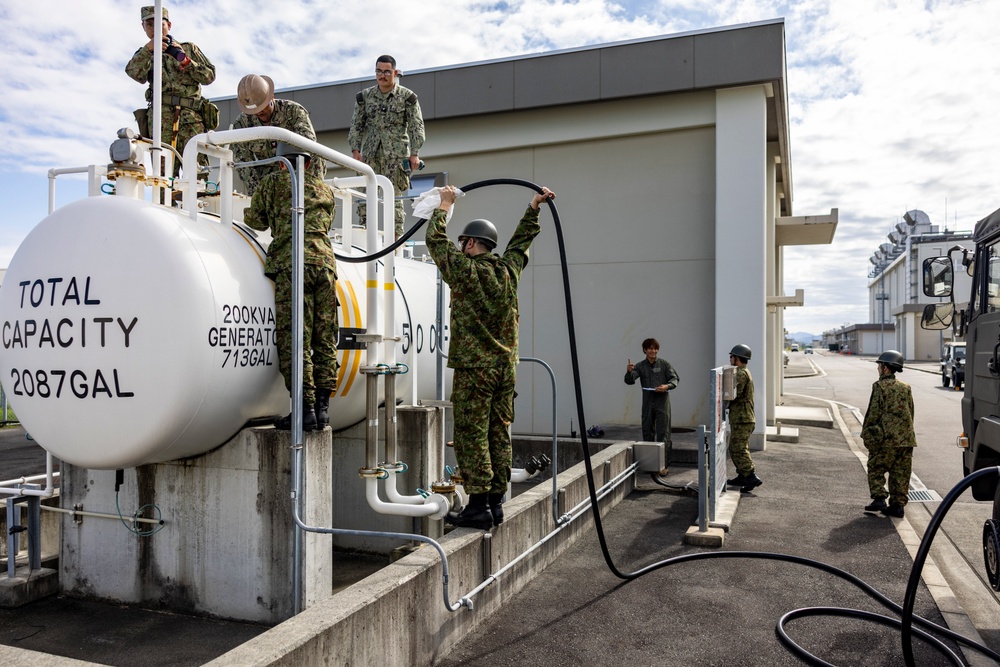 NMCB 4 and JGSDF refuel generators during Active Shield 26 NMCB 4 and JGSDF refuel generators during Active Shield 26